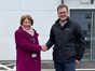 Image shows Councillor Mary Rayner and Andrew Lewis shaking hands in front of Silverwoods industrial unit