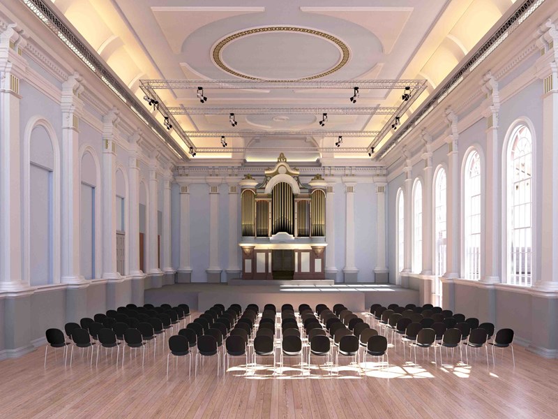 Image of proposed music room with light wood floor. black chairs, white walls and high ceiling.